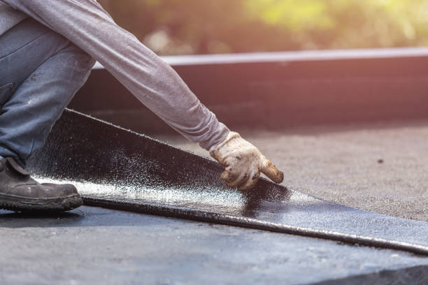 Professional Basement Waterproofing technician working in Petersburg, IN